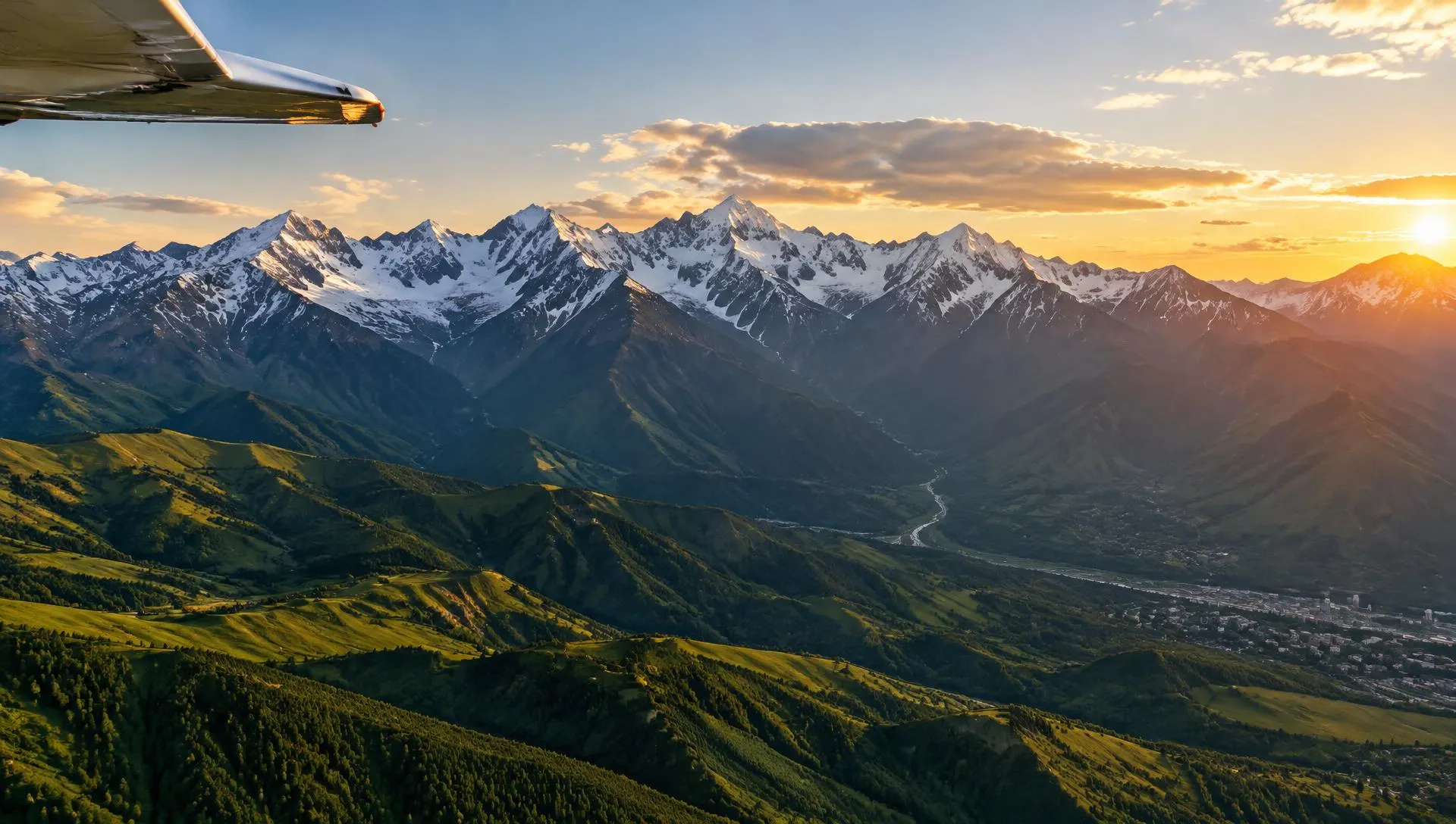 Trans-Ili Alatau mountains above Almaty seen from a light aircraft at sunset